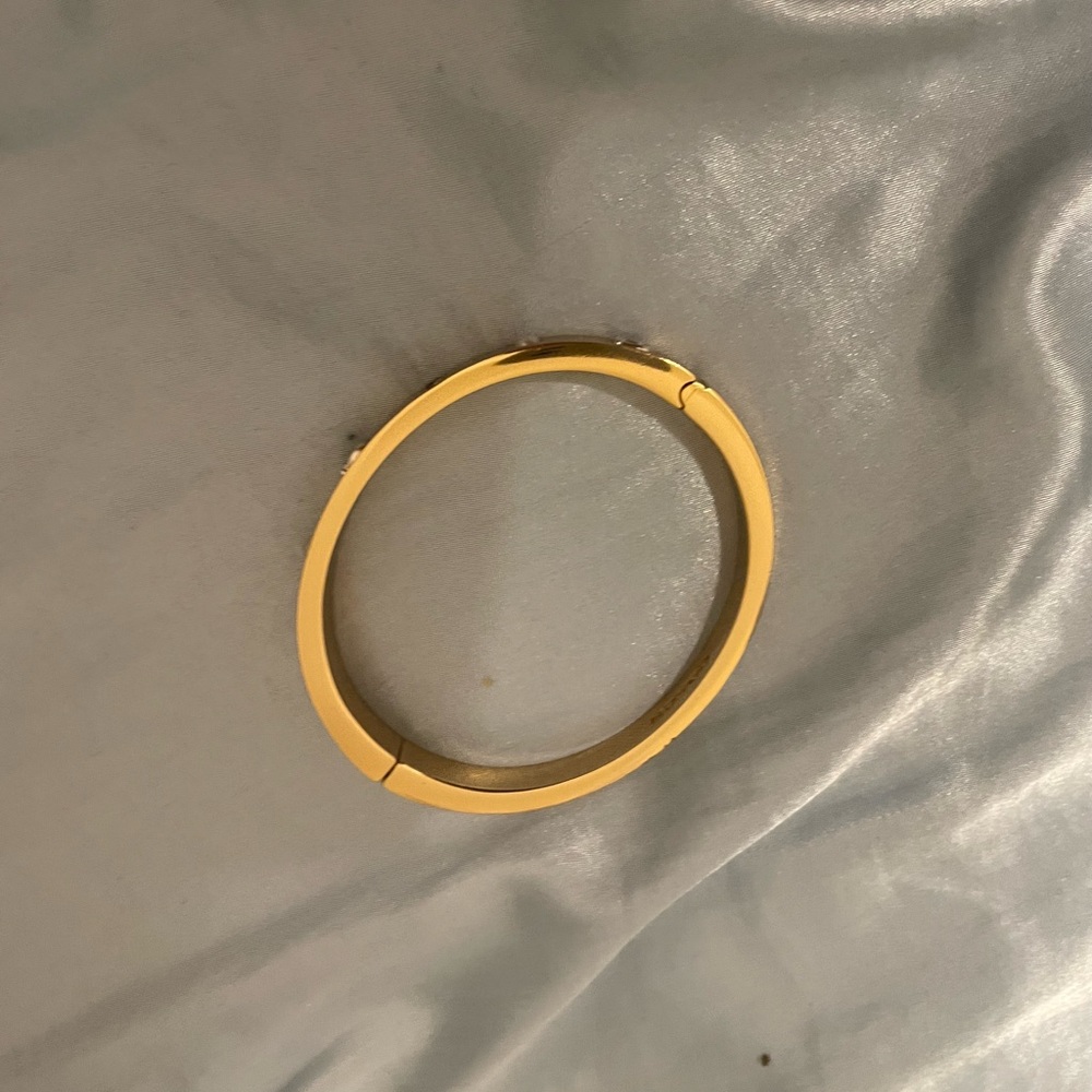 Signature hinge bangle by Coach in gold - Picture 2 of 3